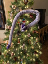 Load image into Gallery viewer, A very long pony like a scarf. The flank has a purple star and blue aurora on it. Hair is purple with blue streak. Eye is purple.