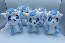 Load image into Gallery viewer, A white fox plush that has blue arms and feet. It has blue eyes and white ears with blue triangles. It has a white curly hair piece on its head with blue in the middle and blue swirls. The tail is white and blue with blue swirls. It has a small smile