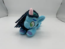 Load image into Gallery viewer, Blue horse plush laying on belly with blue yarn hair. Eye is green. Has a pink horn 
