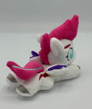 Load image into Gallery viewer, White horse plush laying on belly with pink lightning bolt on flank and pink with blue stripe hair. Eye is blue. Has purple tipped wings and silver hooves.
