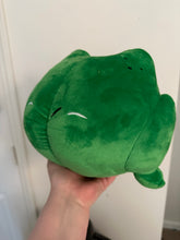 Load image into Gallery viewer, Green frog with angry expression. He has a rather large butt for comedic effect. 
