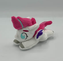 Load image into Gallery viewer, White horse plush laying on belly with pink lightning bolt on flank and pink with blue stripe hair. Eye is blue. Has purple tipped wings and silver hooves.
