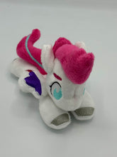 Load image into Gallery viewer, White horse plush laying on belly with pink lightning bolt on flank and pink with blue stripe hair. Eye is blue. Has purple tipped wings and silver hooves.
