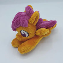 Load image into Gallery viewer, Orange horse plush laying on belly with purple and pink crest on flank and purple hair. Eye is purple.
