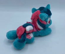 Load image into Gallery viewer, Blue/green horse plush laying on belly with pink and white icecream float on flank and green/pink/white hair. Eye is maroon.
